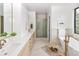 Spa bathroom features a soaking tub and walk-in shower at 2522 Zenobia St, Denver, CO 80212