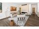 Cozy living room with hardwood floors, modern fireplace, stylish decor, and neutral color palette at 2522 Zenobia St, Denver, CO 80212