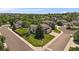 Aerial view of a beautiful two-story home nestled in a lush, green neighborhood at 11506 Greenbriar Ln, Parker, CO 80138