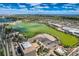 Scenic aerial view overlooking a lake, neighborhood, and the Denver skyline on a bright, sunny day at 4835 Harlan St, Wheat Ridge, CO 80033