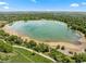 Aerial view featuring the large lake and beaches nearby the property, highlighting the scenic location and recreational opportunities at 2019 Clipper Dr, Lafayette, CO 80026