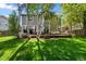 Lovely home featuring a spacious backyard with a deck and seating area, perfect for outdoor entertaining and relaxation at 2019 Clipper Dr, Lafayette, CO 80026