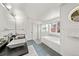 Bathroom with double sinks, granite countertop, soaking tub with tiled backsplash, and walk-in shower at 2019 Clipper Dr, Lafayette, CO 80026