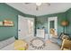Stylish bedroom featuring a rocking chair, comfortable carpet, and white trim accents at 2019 Clipper Dr, Lafayette, CO 80026
