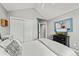 Bedroom boasts vaulted ceilings, plush carpet, and a large closet, complemented by a TV and dresser at 2019 Clipper Dr, Lafayette, CO 80026