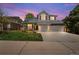 Charming two-story home featuring a stone facade, well-manicured lawn, and a spacious two-car garage at 2019 Clipper Dr, Lafayette, CO 80026