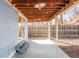 Covered back patio with wood ceiling and string lights offer an inviting outdoor space at 1825 S Adams St, Denver, CO 80210