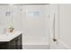 Bathroom features a sleek vanity, subway tile, and updated fixtures at 1825 S Adams St, Denver, CO 80210