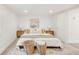 Spacious bedroom featuring a neutral palette and decorative area rug at 1825 S Adams St, Denver, CO 80210