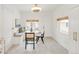 Bright breakfast nook featuring bench seating and ample natural light at 1825 S Adams St, Denver, CO 80210