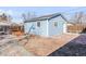 Backyard shed featuring a blue exterior, newer roof, and plenty of space for outdoor storage at 1825 S Adams St, Denver, CO 80210