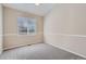 Neutral bedroom with carpet, a window, and neutral walls at 22436 E Maplewood Pl, Aurora, CO 80015