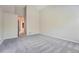 Large bedroom with neutral walls and carpeted floors at 22436 E Maplewood Pl, Aurora, CO 80015