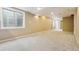 Unfinished basement with a window and neutral walls at 5885 Cheetah Cv, Lone Tree, CO 80124