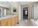 Double sink bathroom with a separate shower and tub at 5885 Cheetah Cv, Lone Tree, CO 80124