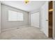 Bright bedroom with double door closet and neutral walls at 5885 Cheetah Cv, Lone Tree, CO 80124