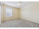 Spacious bedroom with window and ceiling fan at 5885 Cheetah Cv, Lone Tree, CO 80124