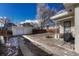 Large backyard with a detached garage and gravel area at 2031 Meade St, Denver, CO 80211