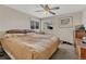 Main bedroom with a ceiling fan and large windows at 2031 Meade St, Denver, CO 80211