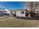 Ranch style home with a spacious yard and detached garage at 2031 Meade St, Denver, CO 80211