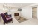 Comfortable finished basement with plush carpet, tv, storage and a cozy seating area at 742 Megan Ct, Longmont, CO 80504