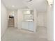 Basement with a small wet bar and stairs leading to other areas of the home at 742 Megan Ct, Longmont, CO 80504