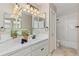 Well-maintained bathroom boasts a vanity with ample counter space and a shower-tub combo at 742 Megan Ct, Longmont, CO 80504