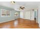 Spacious bedroom features hardwood floors, ample natural light, and a ceiling fan at 742 Megan Ct, Longmont, CO 80504
