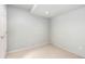 A minimalist bedroom featuring neutral paint, carpet, and modern recessed lighting at 742 Megan Ct, Longmont, CO 80504