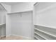Walk-in closet with ample storage space and built-in shelving, offering organization and convenience at 742 Megan Ct, Longmont, CO 80504