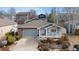 Charming single-Gathering home with brick and siding, featuring a front porch and well-maintained landscaping at 742 Megan Ct, Longmont, CO 80504