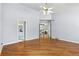 Expansive living room with wood floors and access to other rooms, showcasing the open layout of the house at 742 Megan Ct, Longmont, CO 80504