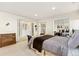 The main bedroom offers generous closet space and flows into an ensuite bathroom at 742 Megan Ct, Longmont, CO 80504