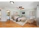 Comfortable main bedroom with en-suite bathroom, providing a private and relaxing retreat with ample natural light at 742 Megan Ct, Longmont, CO 80504