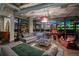 Inviting living room featuring comfortable seating, unique decor, and stunning city views through expansive windows at 2100 16Th St # 412, Denver, CO 80202