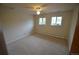 Bright bedroom with neutral walls, soft carpeting, and an abundance of natural light at 8450 Mason Cir, Westminster, CO 80031