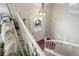 Inviting foyer with new front door, warm wood flooring and light-filled entry at 3312 Meadow Ave, Broomfield, CO 80020