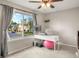 Bright office space featuring a large window, modern desk, and comfortable seating at 3312 Meadow Ave, Broomfield, CO 80020