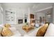 Cozy living room showcasing a fireplace, built-in shelves, and comfortable seating area at 5322 Shetland Ct, Highlands Ranch, CO 80130