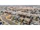 Aerial view of the neighborhood featuring various home styles, streets, and community layout at 10360 Sierra Ridge Ln, Parker, CO 80134