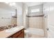 Bathroom with single vanity, tub, and shower at 11932 W Long Cir # 201, Littleton, CO 80127