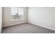 Spacious bedroom with neutral walls and carpet flooring at 11932 W Long Cir # 201, Littleton, CO 80127