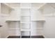 Walk-in closet with hanging rods and shelving at 11932 W Long Cir # 201, Littleton, CO 80127