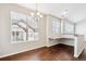 Bright dining area with hardwood floors and a chandelier at 11932 W Long Cir # 201, Littleton, CO 80127