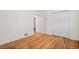 Bright bedroom with hardwood floors and a closet at 1876 S Chester Cir, Denver, CO 80247