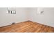 Bedroom with hardwood floors and lots of natural light at 1876 S Chester Cir, Denver, CO 80247