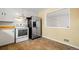 Stainless steel appliances in this galley kitchen at 1876 S Chester Cir, Denver, CO 80247