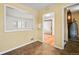 Kitchen with view of living room and laundry hookups at 1876 S Chester Cir, Denver, CO 80247