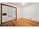 Hardwood floor living room with fireplace view at 1876 S Chester Cir, Denver, CO 80247