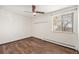 Bedroom with laminate flooring, ceiling fan and window with a view at 300 S Clinton St # 10C, Denver, CO 80247